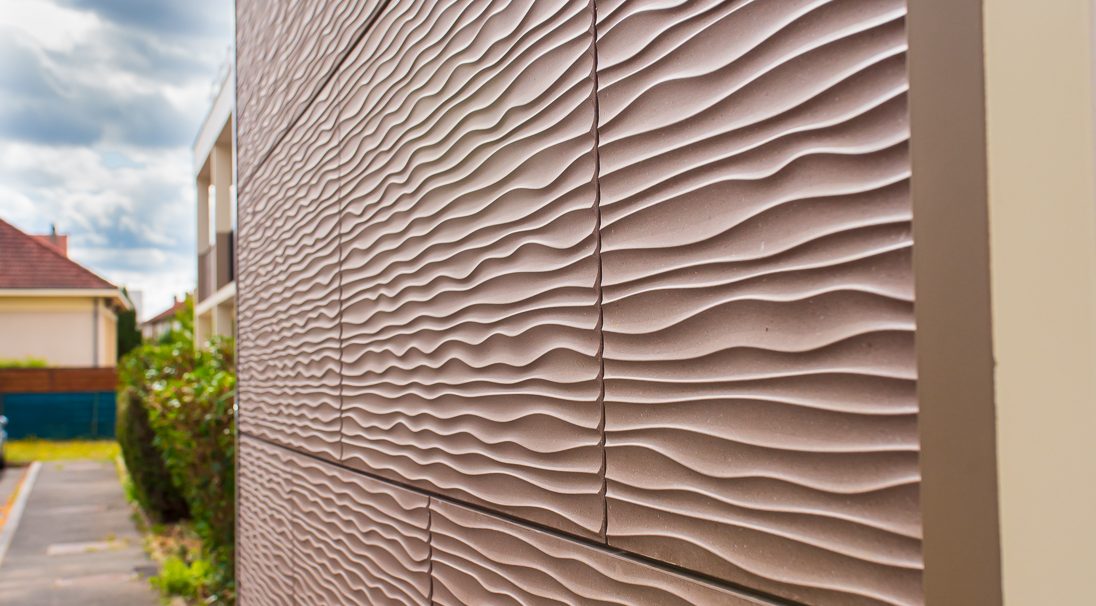 Location: Ermont (France), 
Construction type: rehabilitation, 
Installation system: wall cladding without backing structure (CWoB), 
Product: DUNE & SMOOTH
